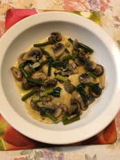 Aged prosciutto ricotta basil cappeletti with leek leaves garlic sticks and mushrooms sauce.JPG